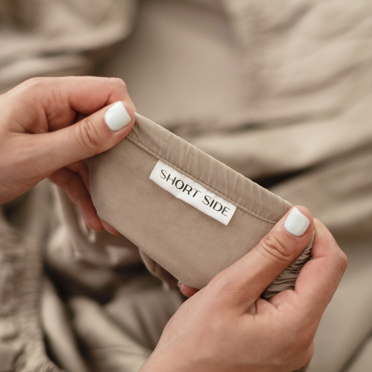 Sand beige organic cotton satin sheet with elastic