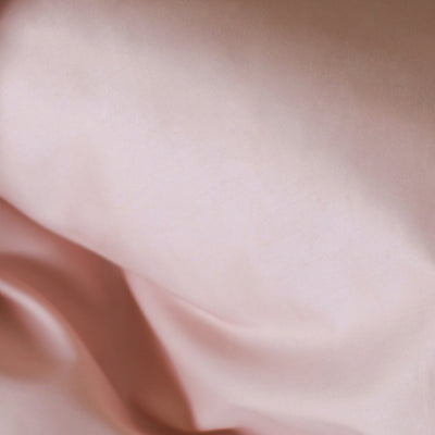 Soft pink organic cotton satin bedding